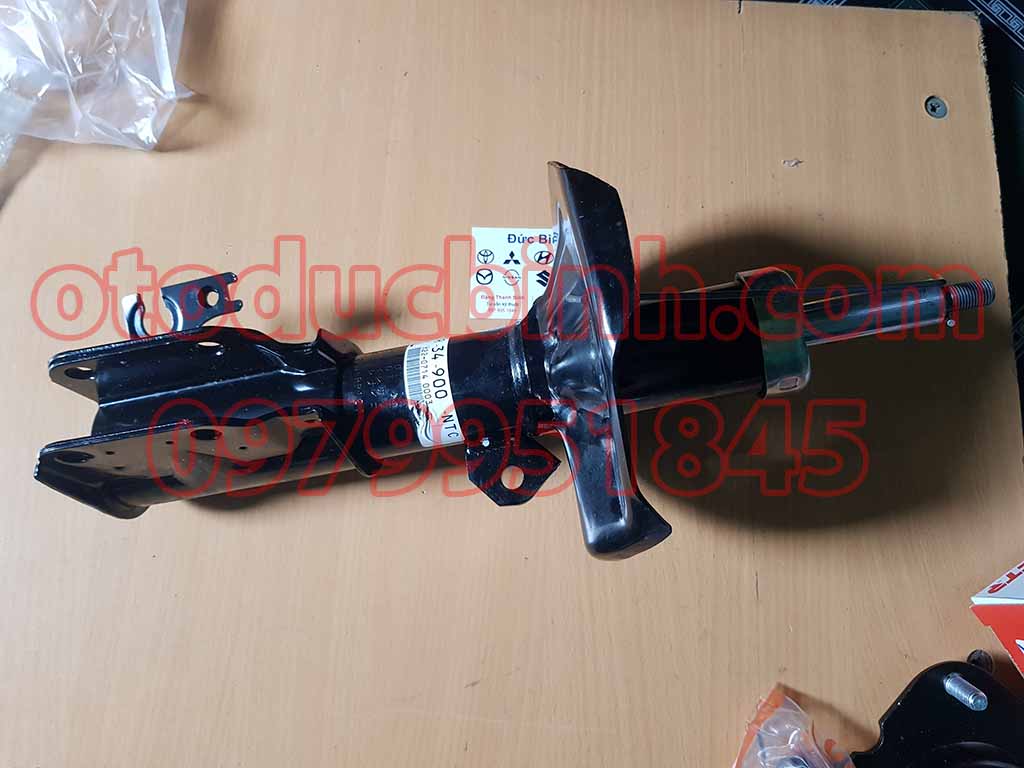 Giảm xóc trước Mazda 323 2001-2004