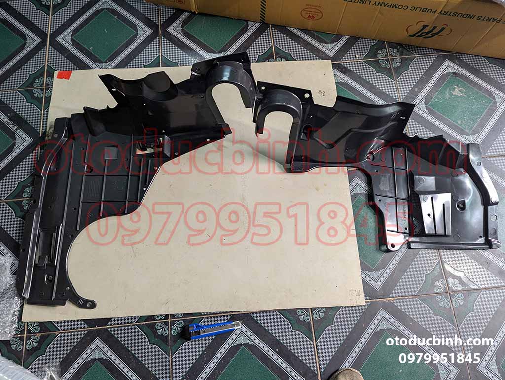 Chắn bùn gầm máy Ford Laser