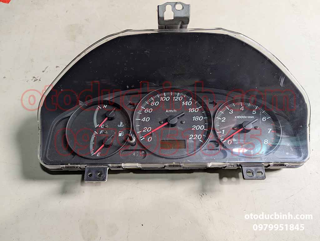 Đồng hồ táp lô Mazda 323